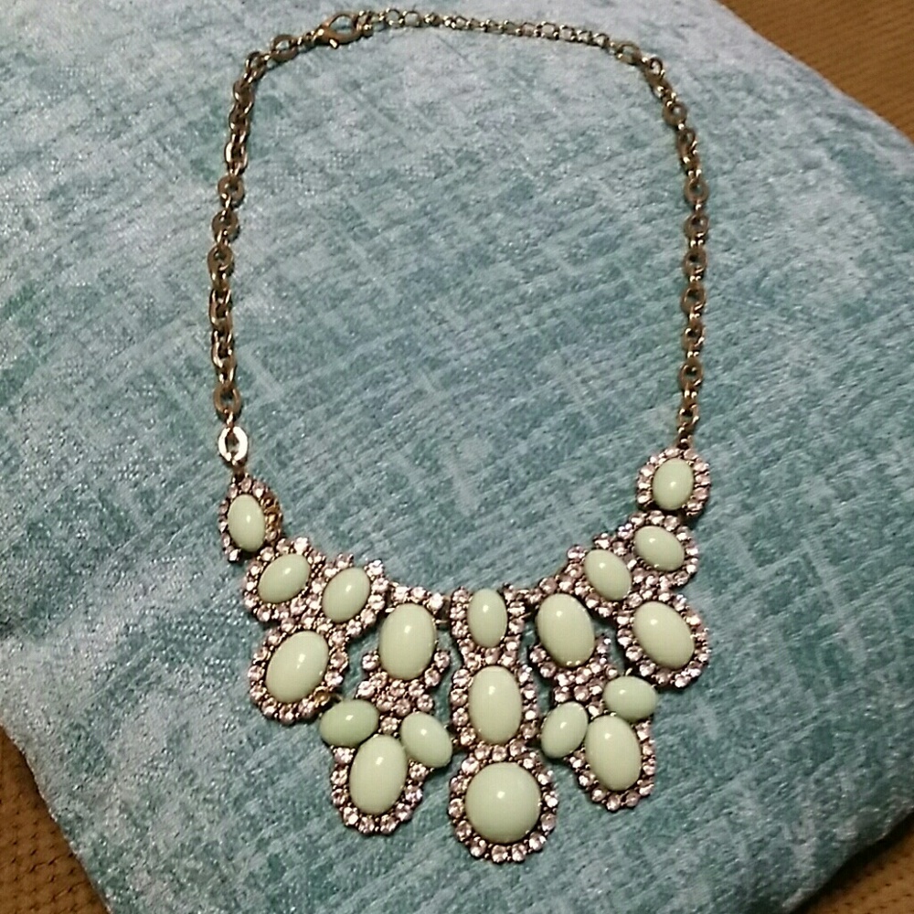 Gold necklace with light green and rhinestones